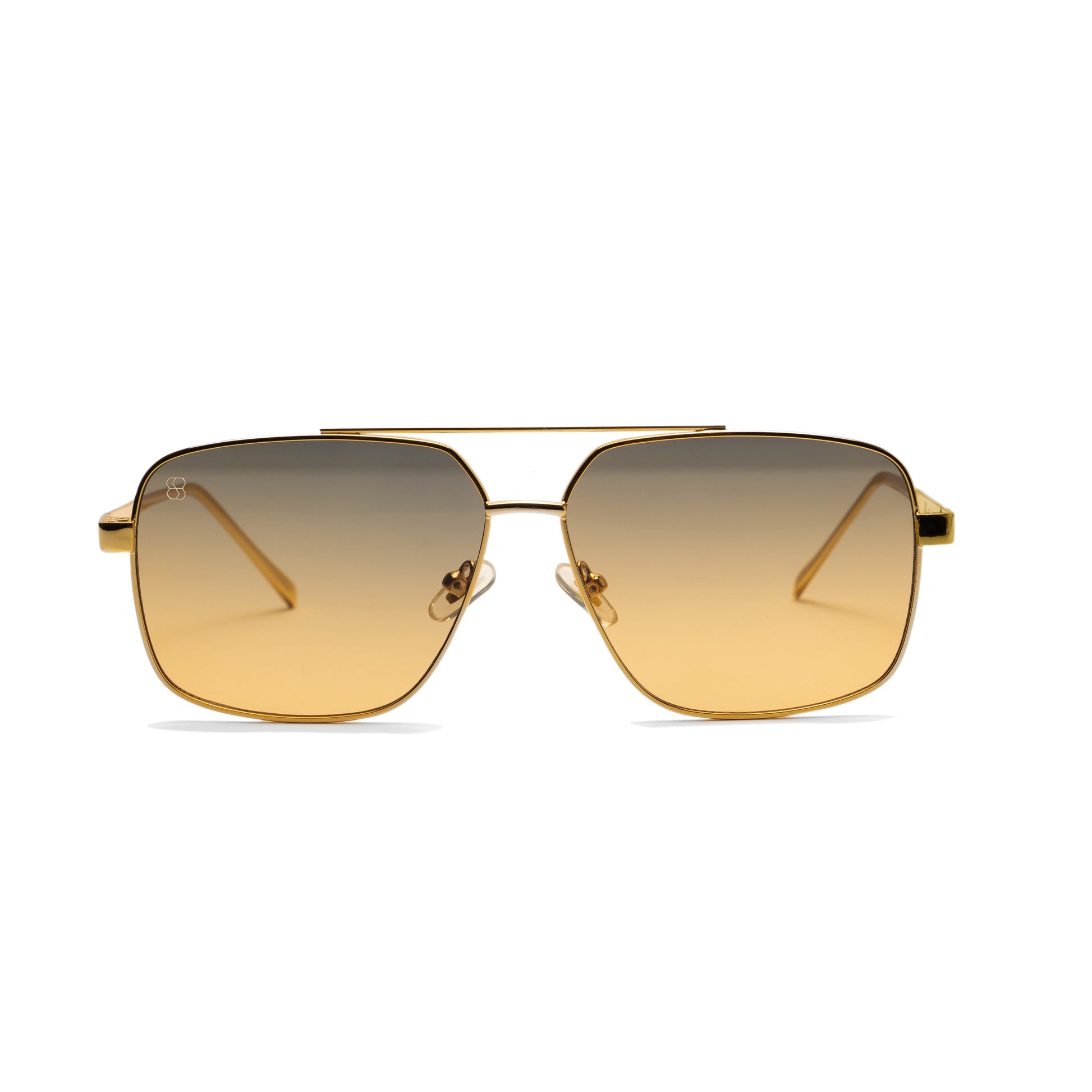 Close-up of oversized square sunglasses with gold metal frames and amber gradient lenses. Luxurious, angular design from 1980nine.