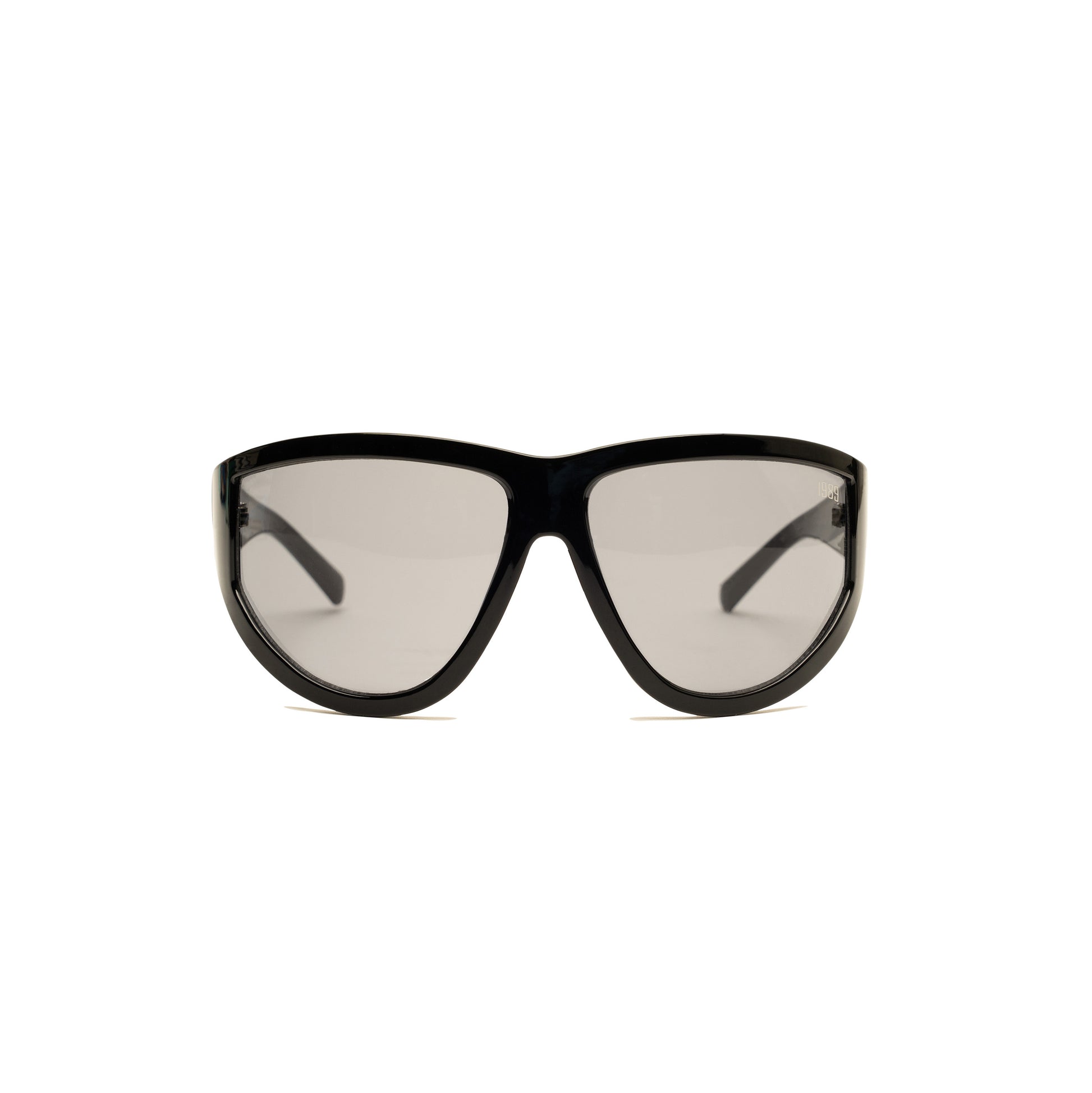 Oversized curved sunglasses with sleek black frame and smokey grey lenses.