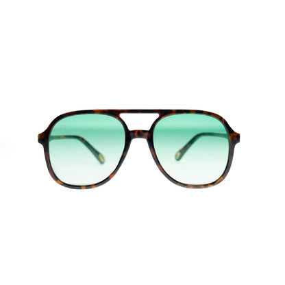 Think metal aviator sunglasses with green gradient lenses and minimalist frame design. Modern, professional eyewear from 1980nine.