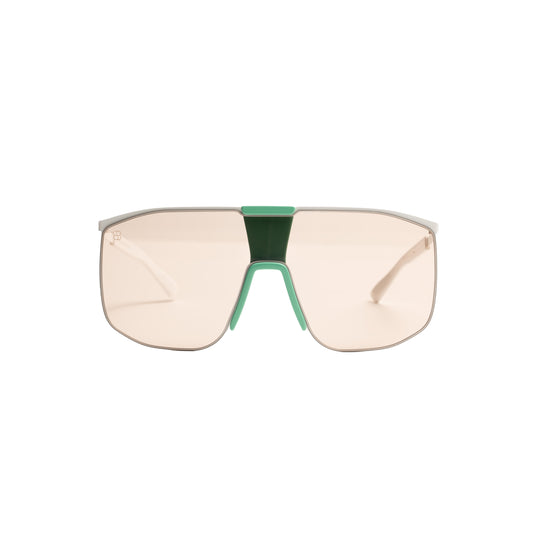 oversized shield sunglasses with emerald green bridge and blush tinted single shield lens.