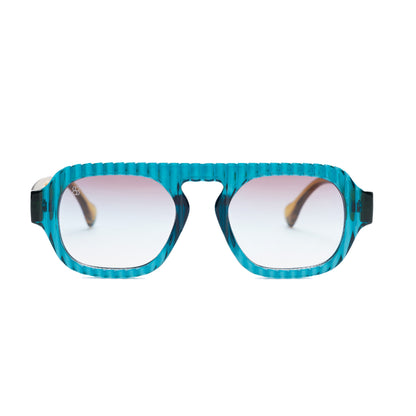 Oversized rectangular shield sunglasses with bright cobalt blue ribbed frame and gradient icy blue lenses.