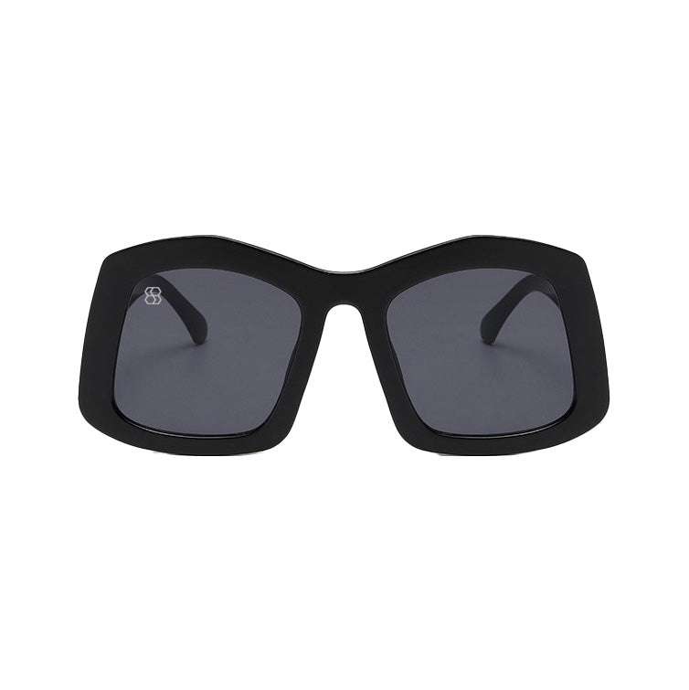 Black sunglasses with dark lenses on a white background